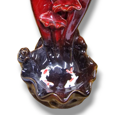 Rökelsehållare fiskdamm